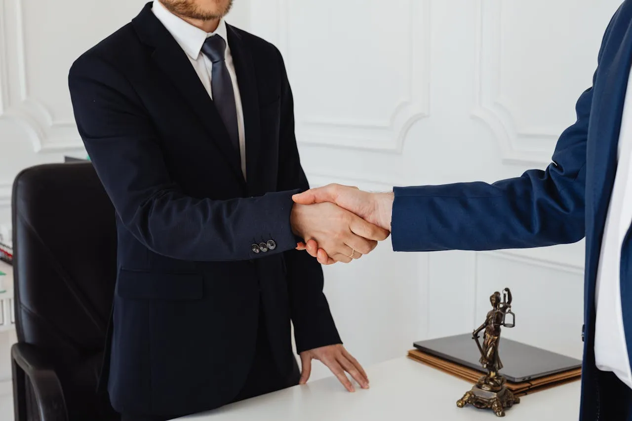 Personal injury lawyer consulting with a client in an office